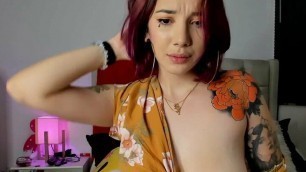 Otaku redhead has amazing tits, but also her ass is incredible